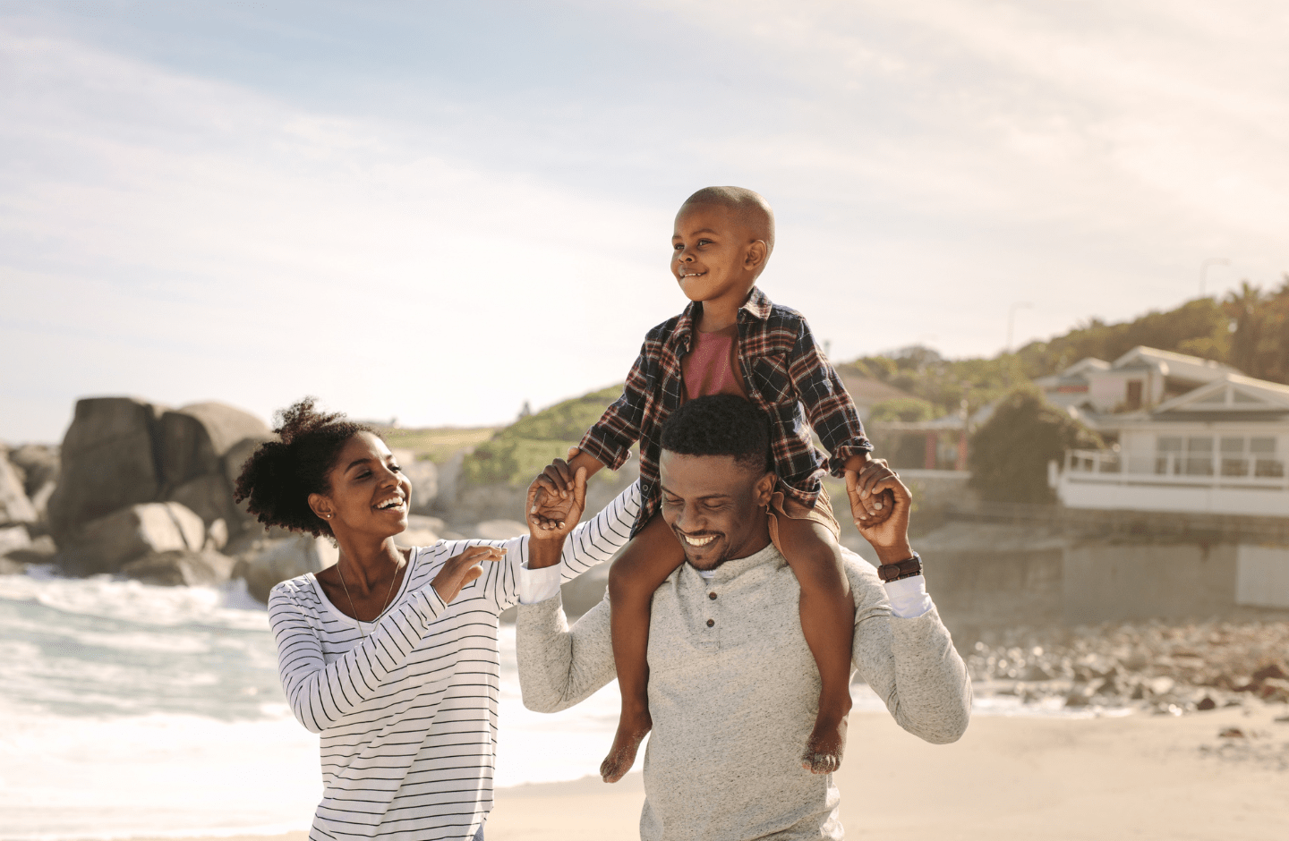 family walking on the beach